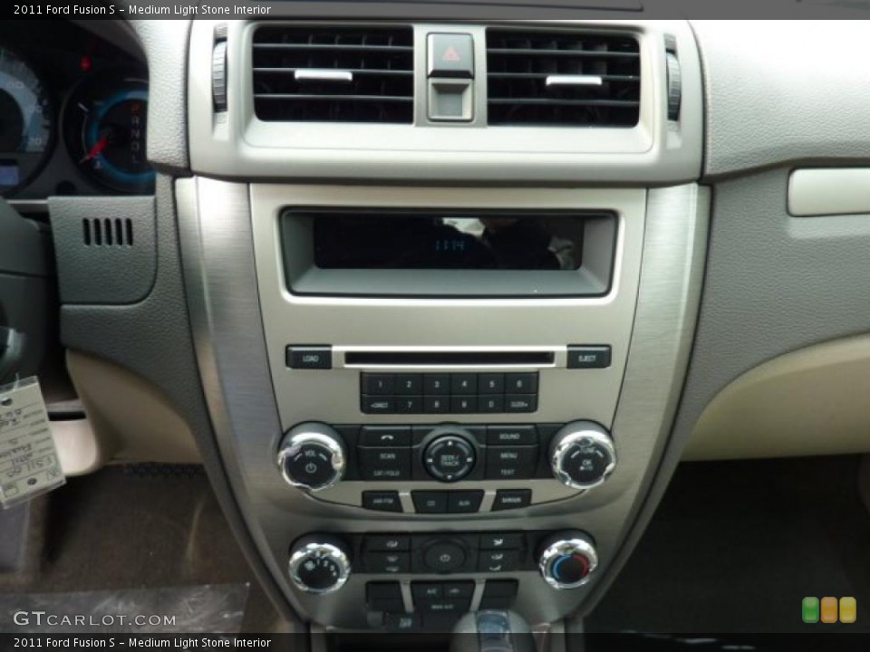 Medium Light Stone Interior Controls for the 2011 Ford Fusion S #46312859