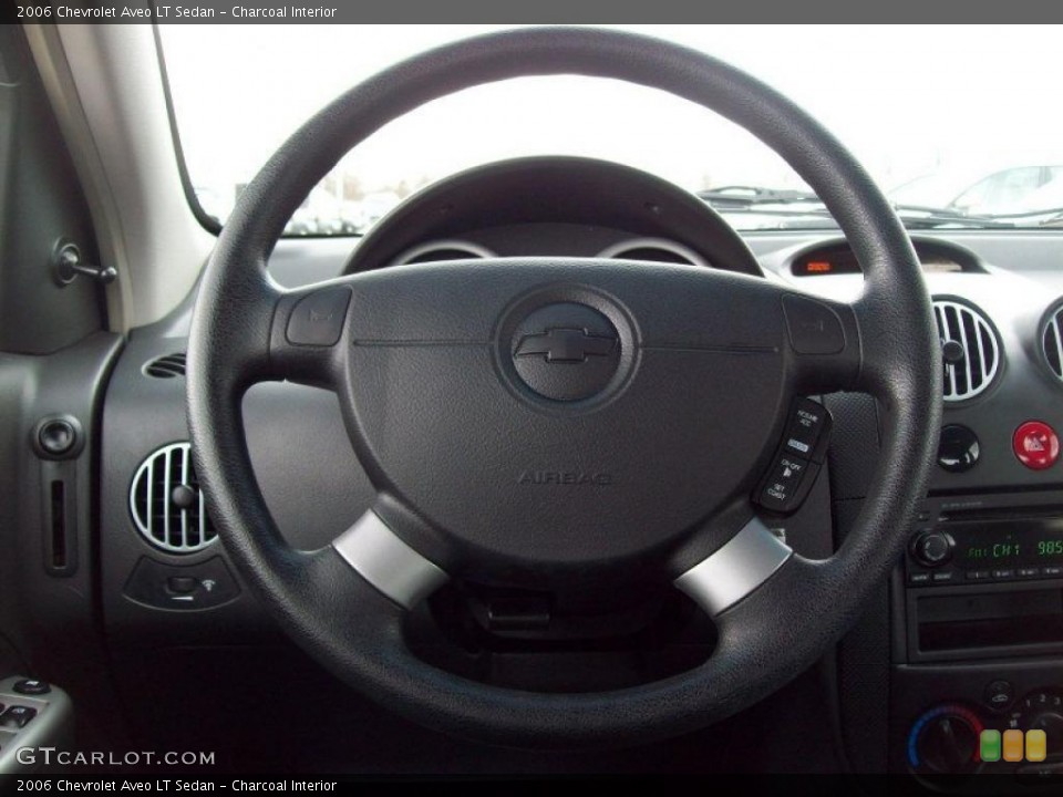 Charcoal Interior Steering Wheel for the 2006 Chevrolet Aveo LT Sedan #46319520