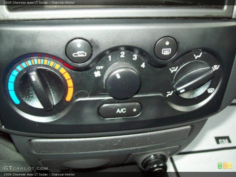 Charcoal Interior Controls for the 2006 Chevrolet Aveo LT Sedan #46319568