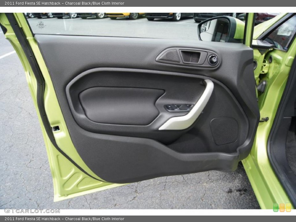 Charcoal Black/Blue Cloth Interior Door Panel for the 2011 Ford Fiesta SE Hatchback #46335336