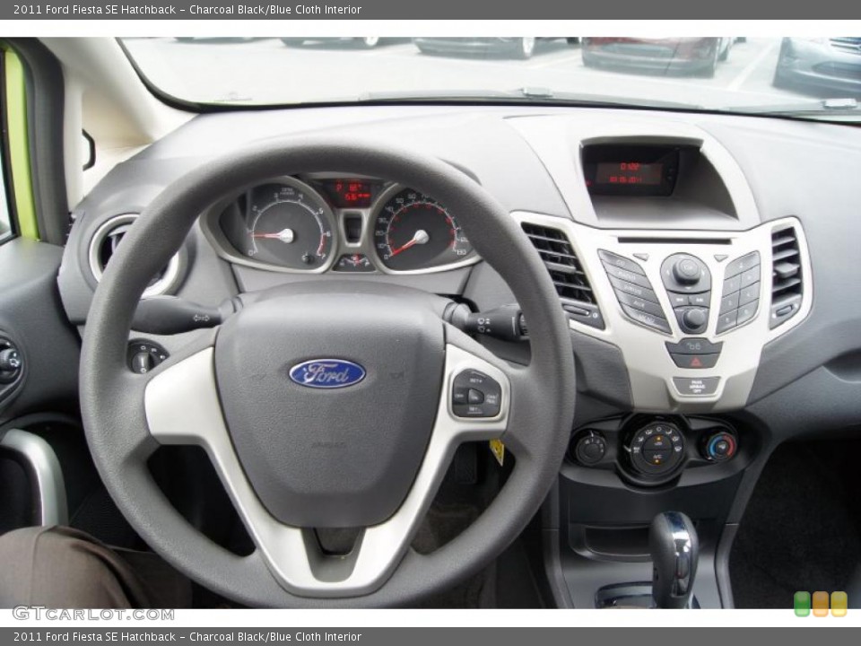 Charcoal Black/Blue Cloth Interior Steering Wheel for the 2011 Ford Fiesta SE Hatchback #46335372