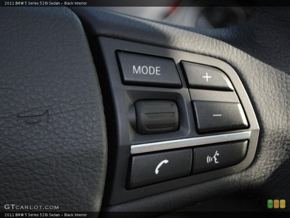 Black Interior Controls for the 2011 BMW 5 Series 528i Sedan #46338348