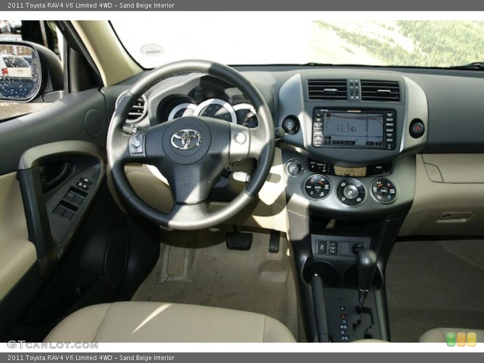 Sand Beige Interior Dashboard for the 2011 Toyota RAV4 V6 Limited 4WD #46339590