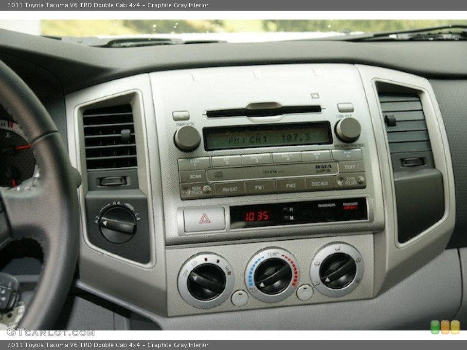 Graphite Gray Interior Controls for the 2011 Toyota Tacoma V6 TRD Double Cab 4x4 #46339941
