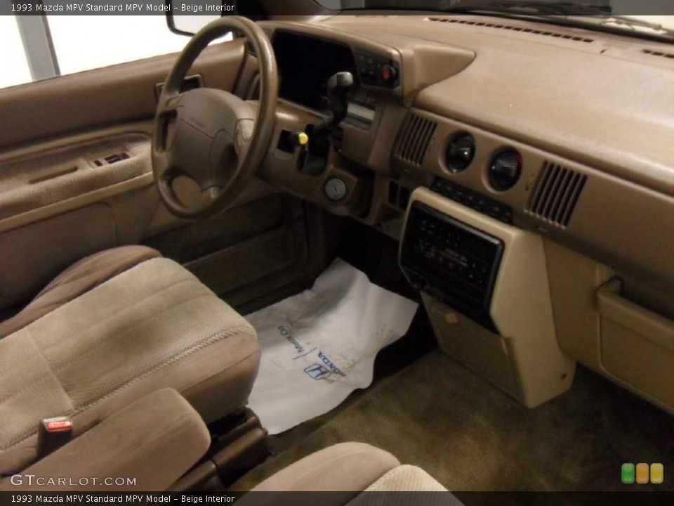 Beige Interior Dashboard for the 1993 Mazda MPV  #46341063