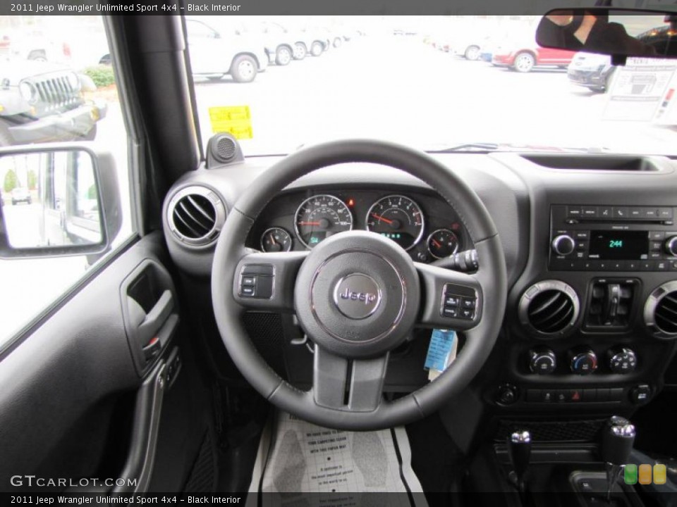 Black Interior Steering Wheel for the 2011 Jeep Wrangler Unlimited Sport 4x4 #46343607