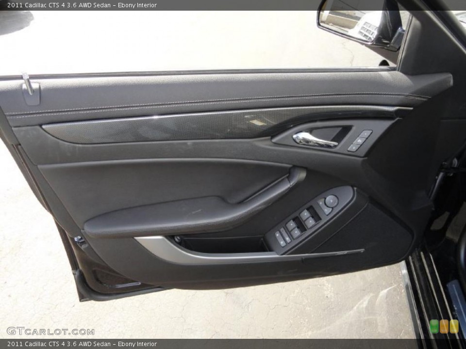Ebony Interior Door Panel for the 2011 Cadillac CTS 4 3.6 AWD Sedan #46345613