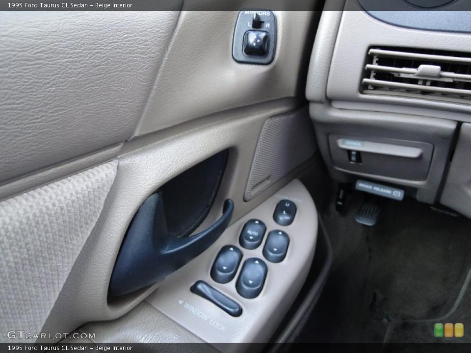 Beige Interior Controls for the 1995 Ford Taurus GL Sedan #46353866