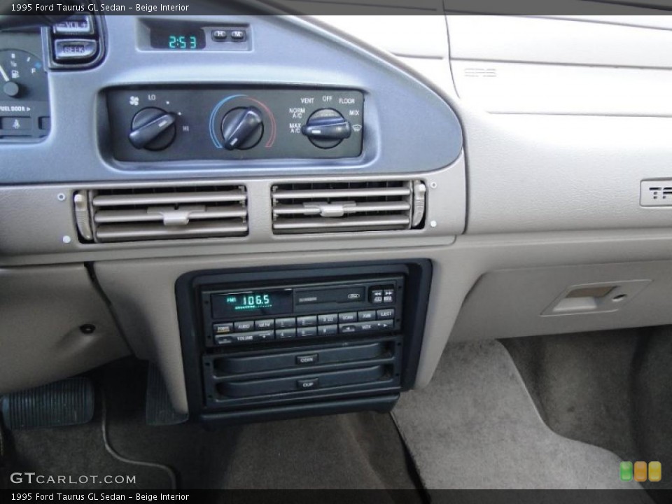 Beige Interior Controls for the 1995 Ford Taurus GL Sedan #46353896