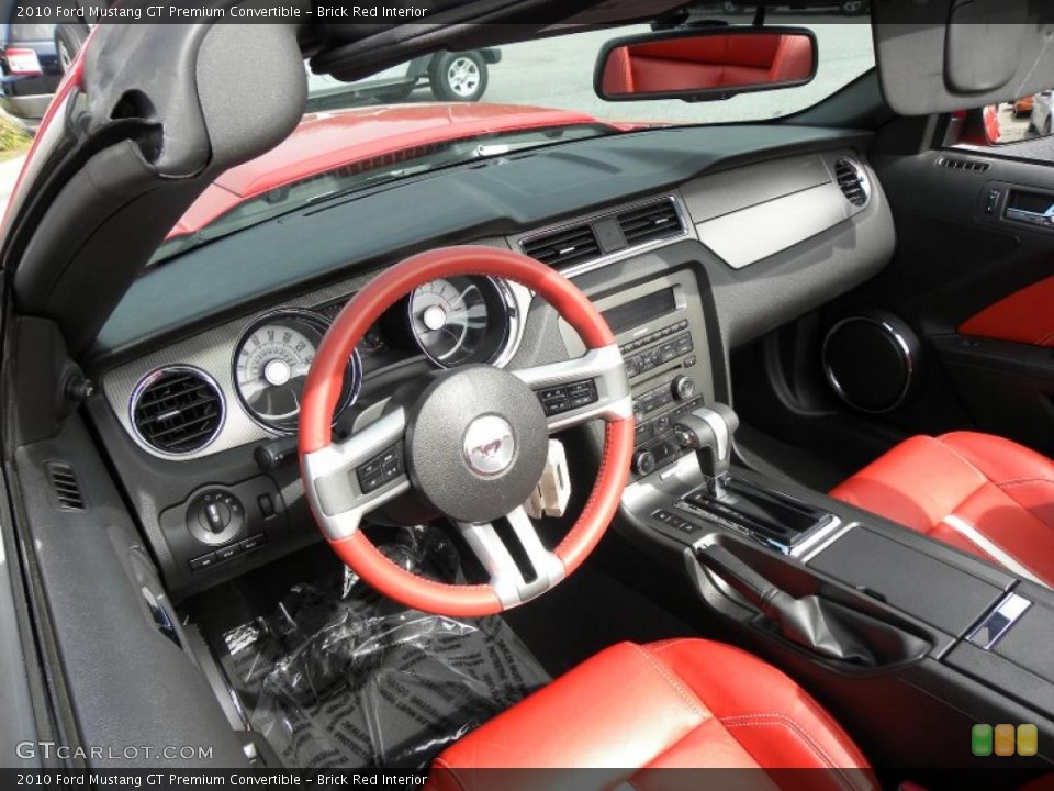 Brick Red Interior Dashboard for the 2010 Ford Mustang GT Premium Convertible #46370052