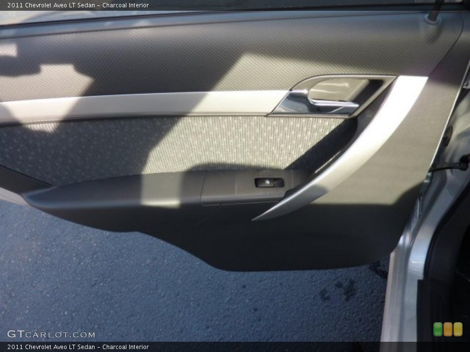 Charcoal Interior Door Panel for the 2011 Chevrolet Aveo LT Sedan #46376325
