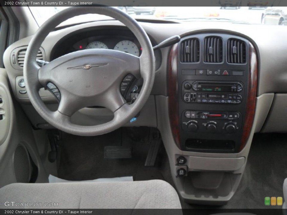 Taupe Interior Dashboard for the 2002 Chrysler Town & Country EX #46380201