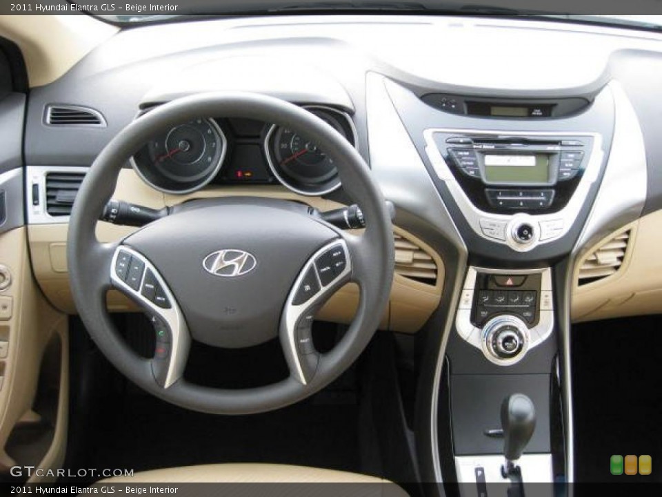 Beige Interior Dashboard for the 2011 Hyundai Elantra GLS #46401243