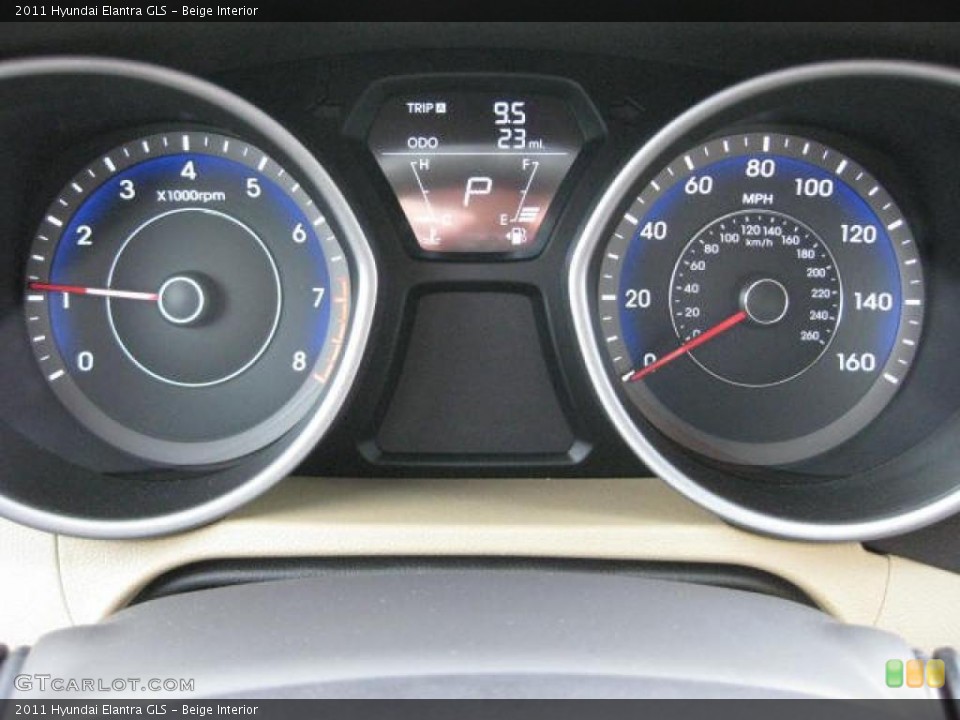 Beige Interior Gauges for the 2011 Hyundai Elantra GLS #46401306