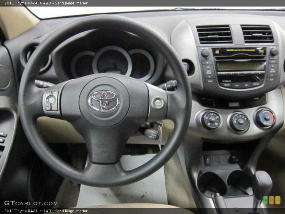 Sand Beige Interior Dashboard for the 2011 Toyota RAV4 I4 4WD #46402008