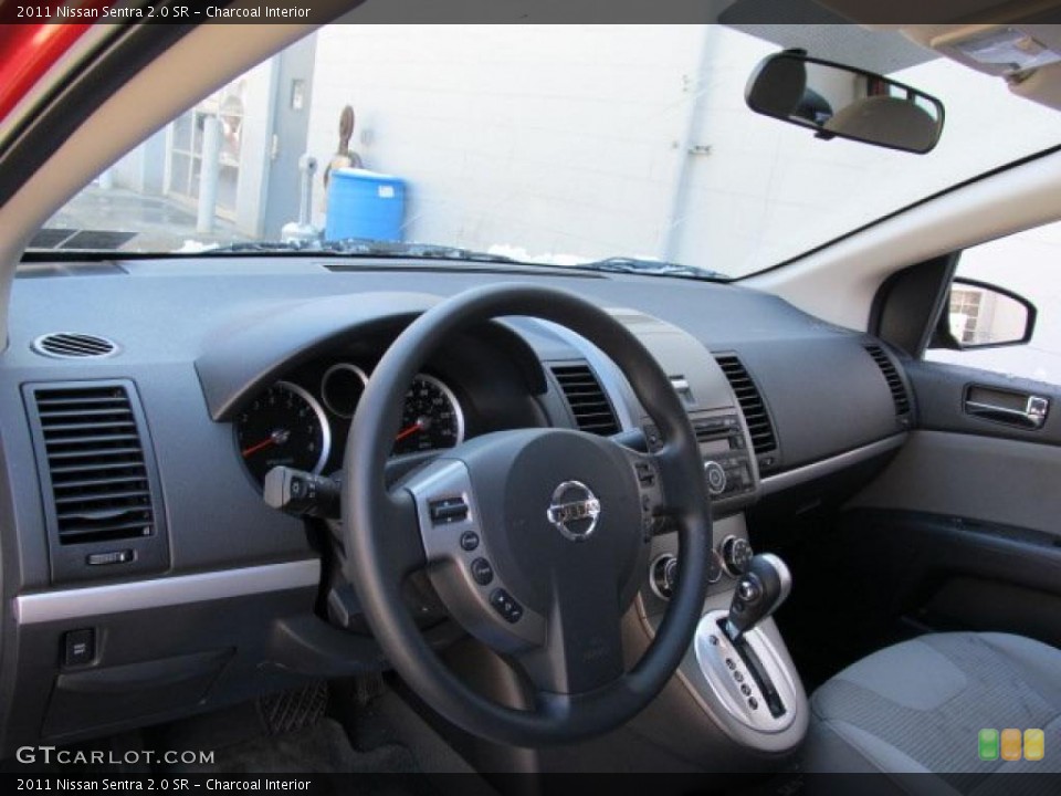 Charcoal Interior Dashboard for the 2011 Nissan Sentra 2.0 SR #46433418