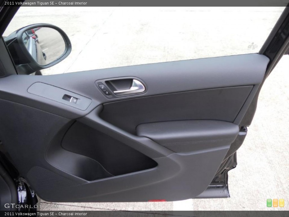 Charcoal Interior Door Panel for the 2011 Volkswagen Tiguan SE #46437948