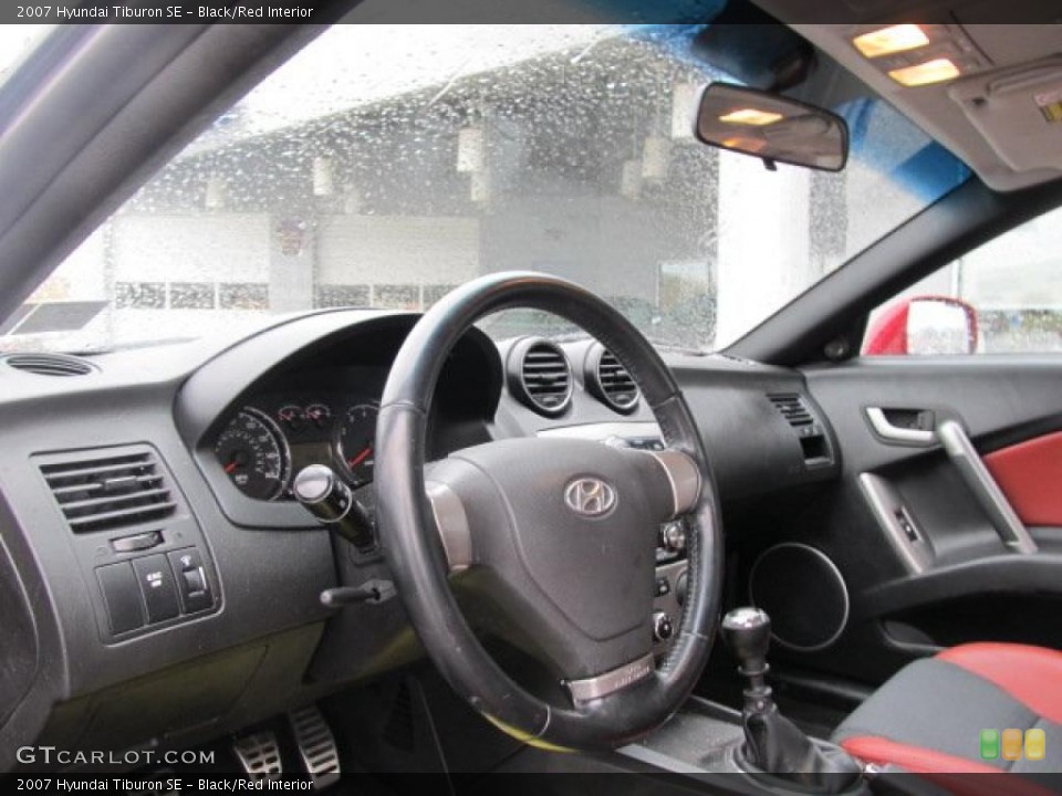 Black/Red Interior Steering Wheel for the 2007 Hyundai Tiburon SE #46456473