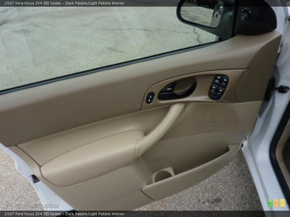 Dark Pebble/Light Pebble Interior Door Panel for the 2007 Ford Focus ZX4 SES Sedan #46464960