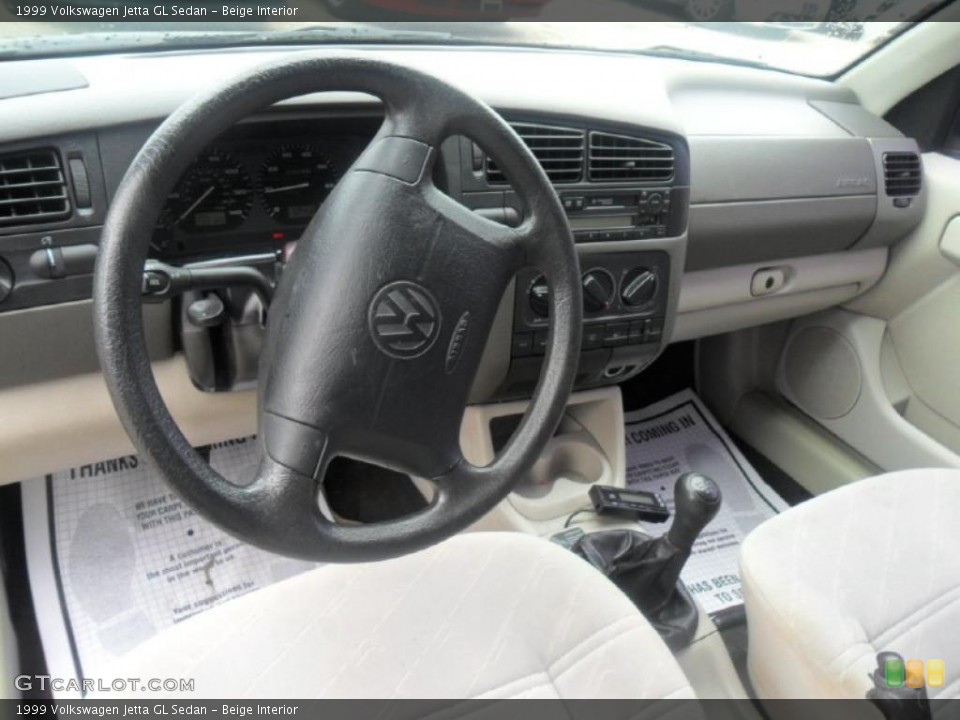 Beige Interior Dashboard for the 1999 Volkswagen Jetta GL Sedan #46466481