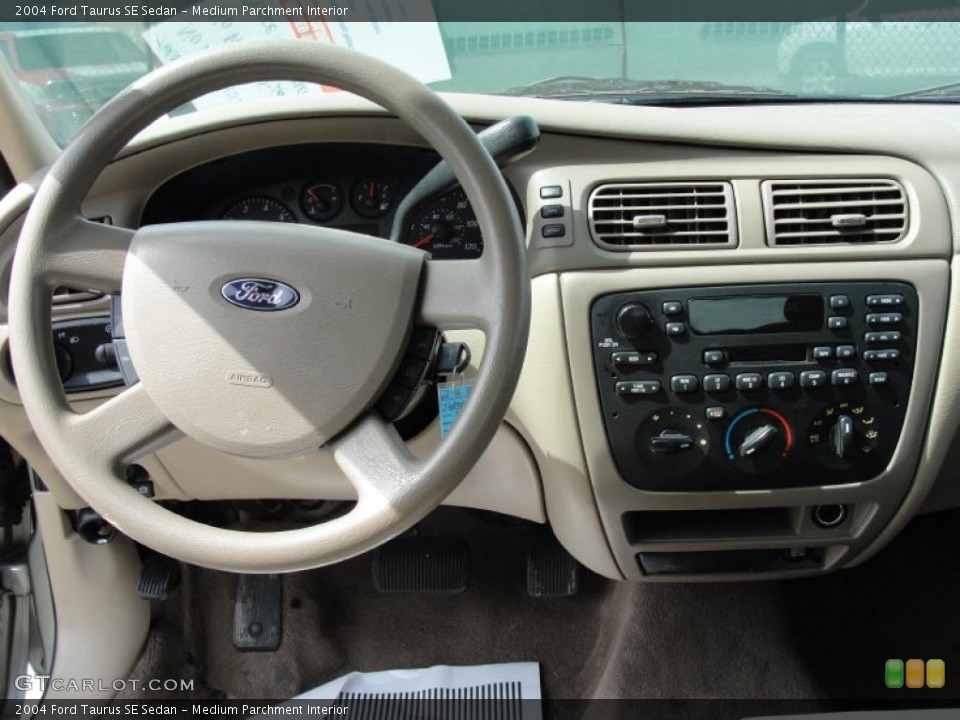 Medium Parchment Interior Dashboard for the 2004 Ford Taurus SE Sedan #46481643