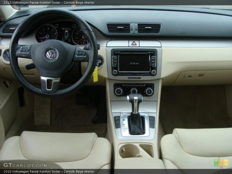 Cornsilk Beige Interior Dashboard for the 2010 Volkswagen Passat Komfort Sedan #46486986