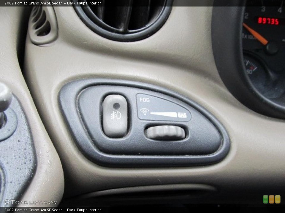 Dark Taupe Interior Controls for the 2002 Pontiac Grand Am SE Sedan #46490061