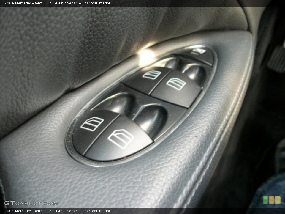 Charcoal Interior Controls for the 2004 Mercedes-Benz E 320 4Matic Sedan #46495059