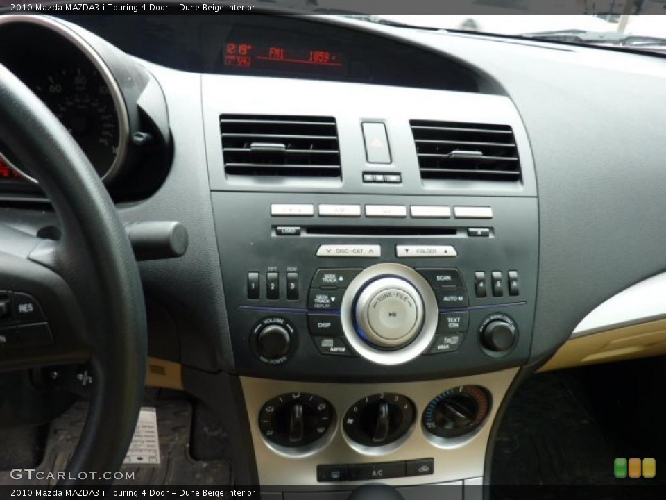 Dune Beige Interior Controls for the 2010 Mazda MAZDA3 i Touring 4 Door #46529835