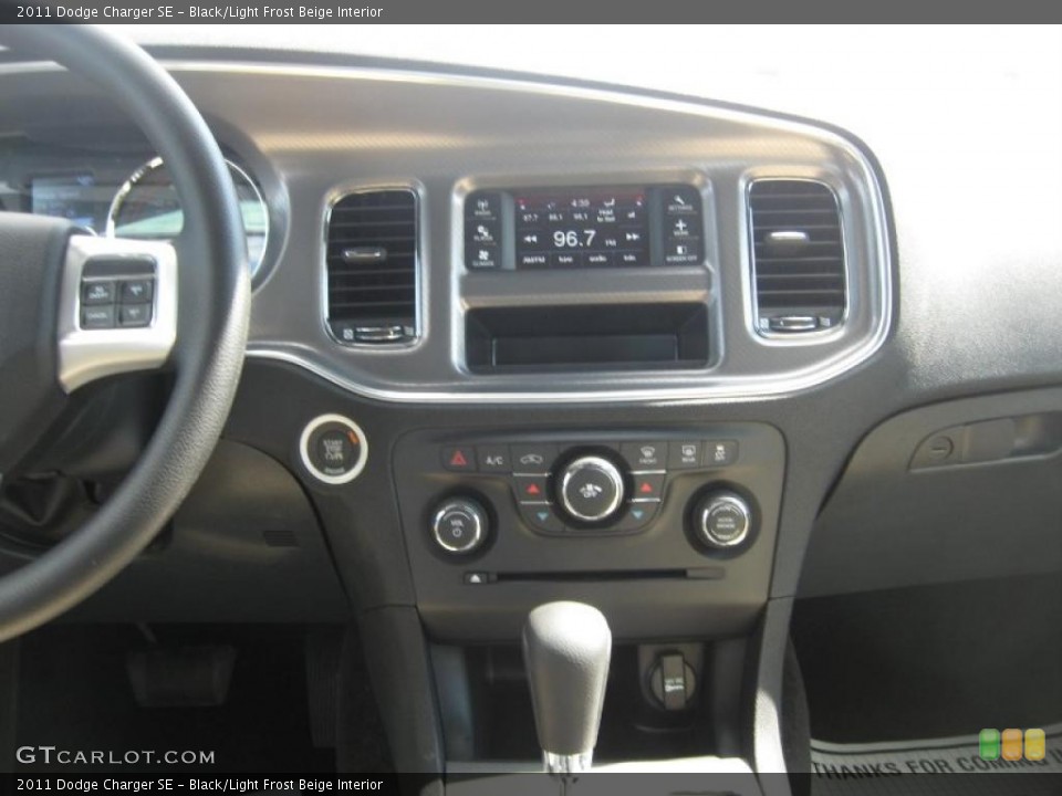 Black/Light Frost Beige Interior Dashboard for the 2011 Dodge Charger SE #46543554