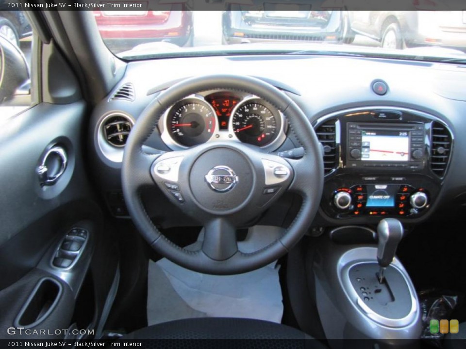 Black/Silver Trim Interior Controls for the 2011 Nissan Juke SV #46590504