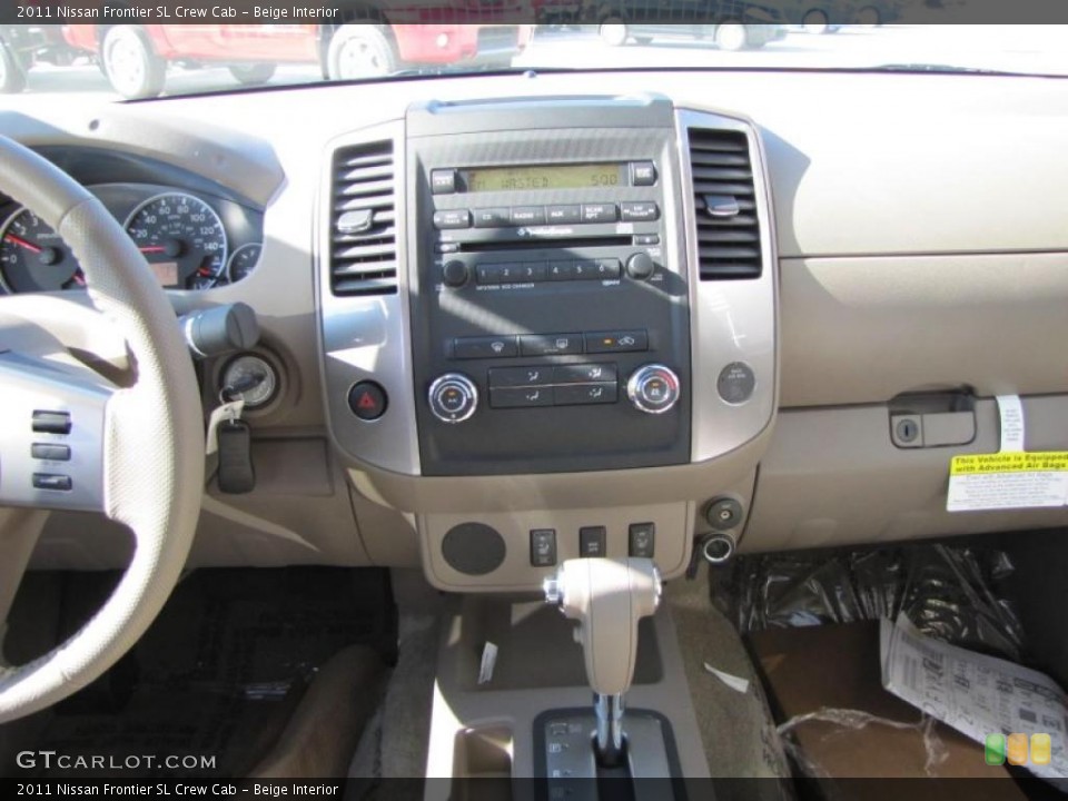 Beige Interior Navigation for the 2011 Nissan Frontier SL Crew Cab #46592261