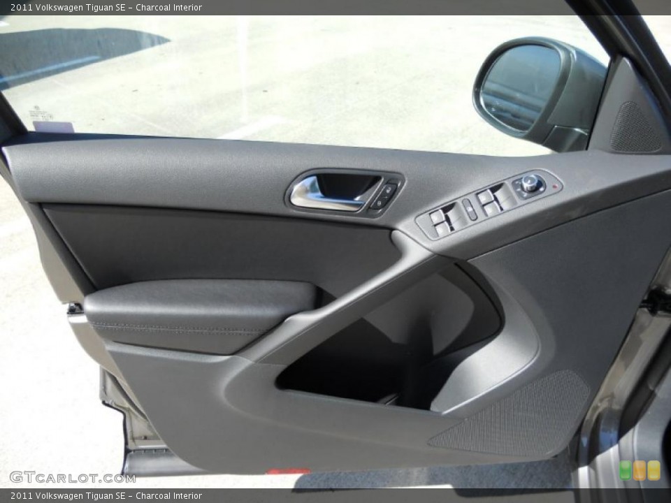 Charcoal Interior Door Panel for the 2011 Volkswagen Tiguan SE #46607464