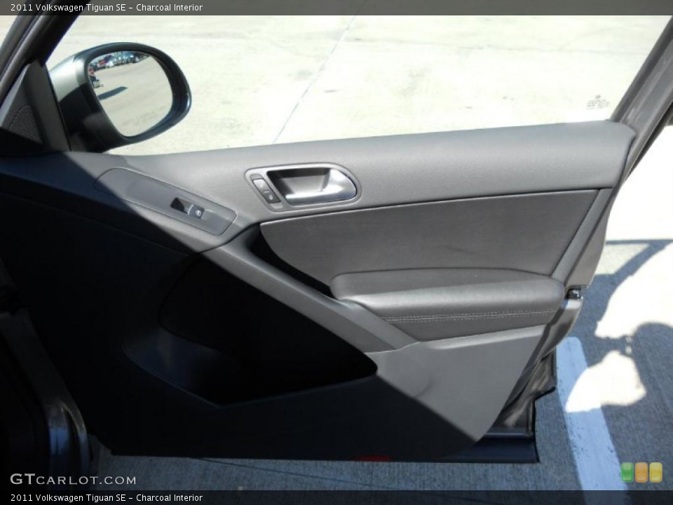 Charcoal Interior Door Panel for the 2011 Volkswagen Tiguan SE #46607473