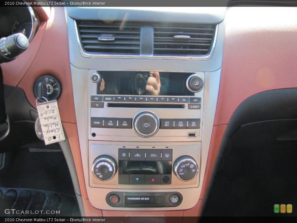 Ebony/Brick Interior Controls for the 2010 Chevrolet Malibu LTZ Sedan #46614877