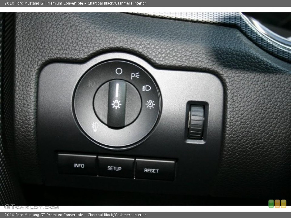 Charcoal Black/Cashmere Interior Controls for the 2010 Ford Mustang GT Premium Convertible #46634873
