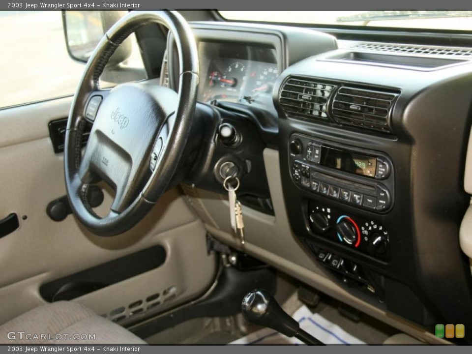 Khaki Interior Dashboard for the 2003 Jeep Wrangler Sport 4x4 #46635827