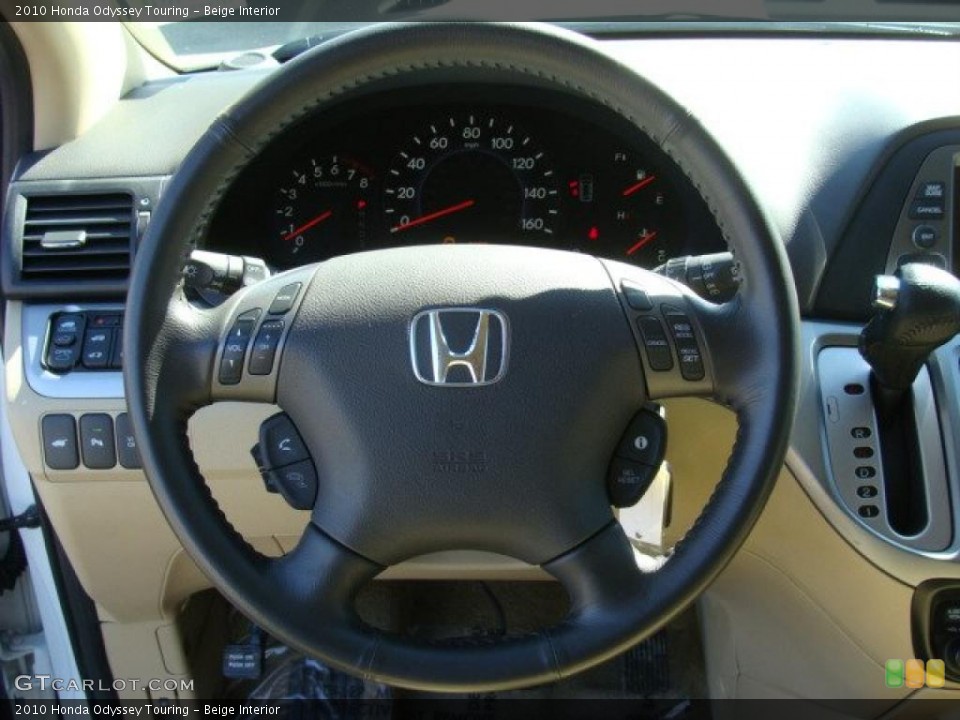 Beige Interior Steering Wheel for the 2010 Honda Odyssey Touring #46646372