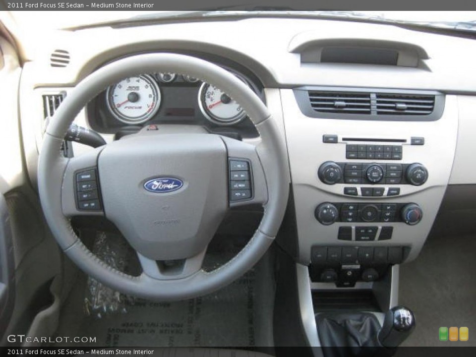 Medium Stone Interior Dashboard for the 2011 Ford Focus SE Sedan #46647452