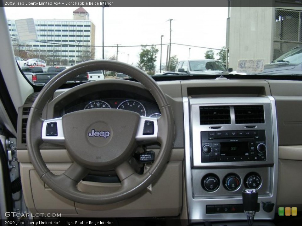 Light Pebble Beige Interior Dashboard for the 2009 Jeep Liberty Limited 4x4 #46651115