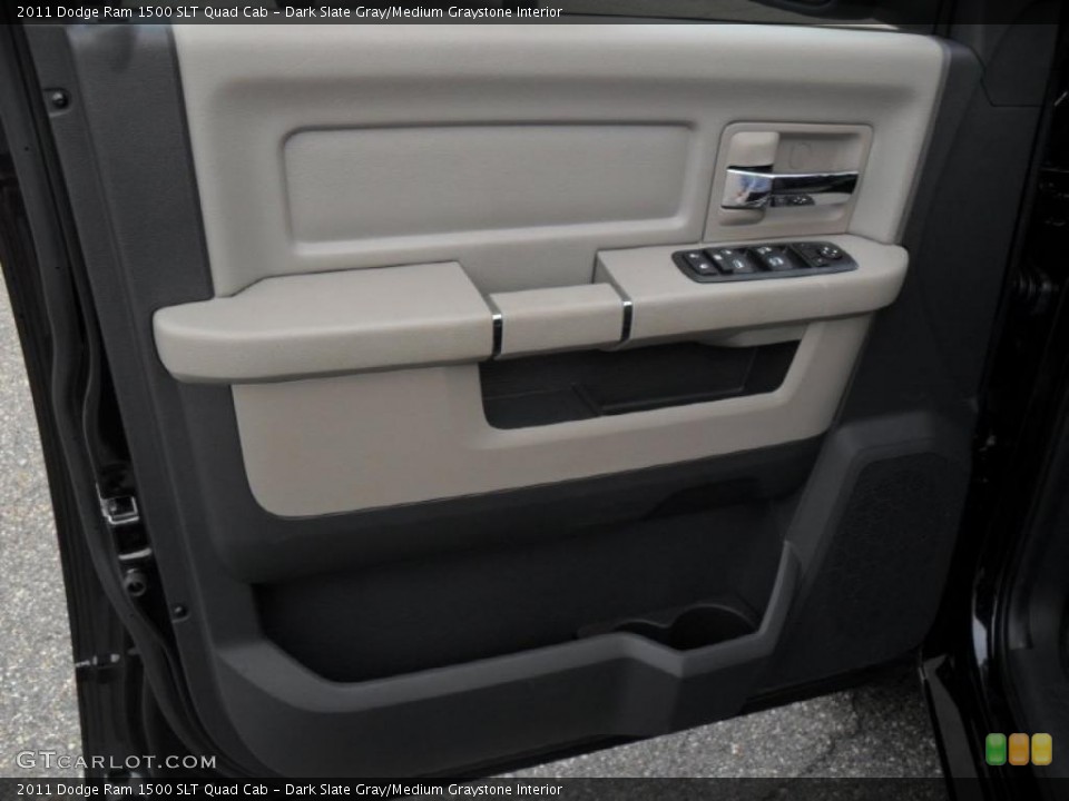 Dark Slate Gray/Medium Graystone Interior Door Panel for the 2011 Dodge Ram 1500 SLT Quad Cab #46655075