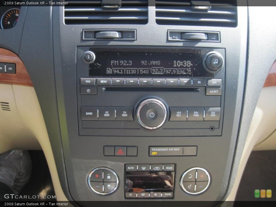 Tan Interior Controls for the 2009 Saturn Outlook XR #46656044