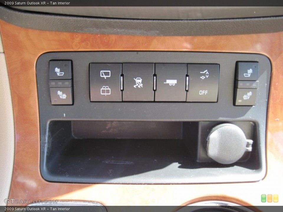 Tan Interior Controls for the 2009 Saturn Outlook XR #46656059