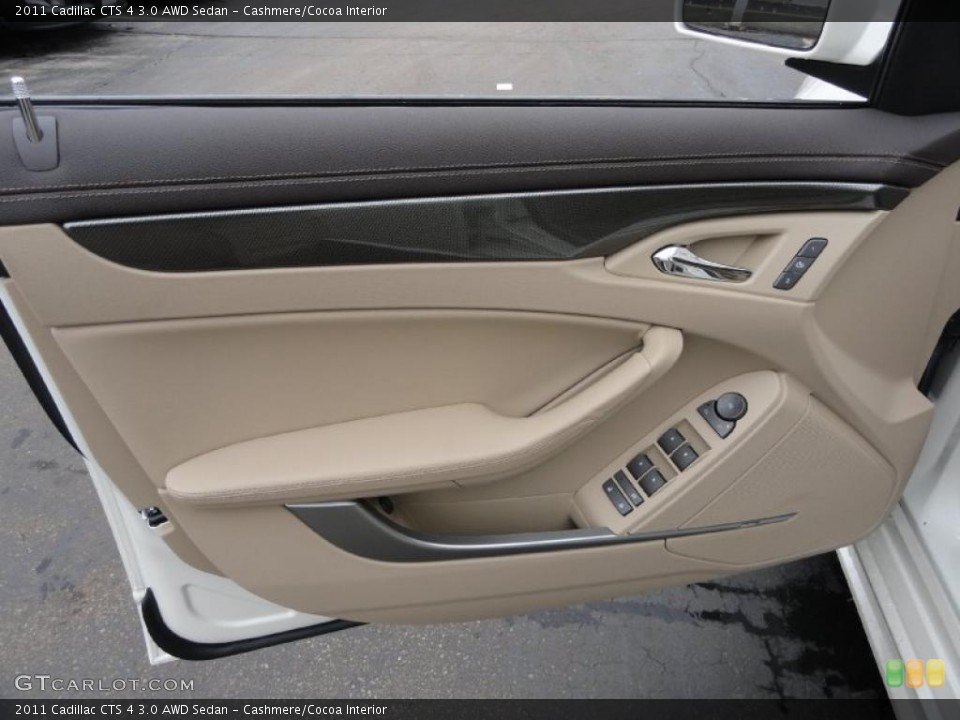 Cashmere/Cocoa Interior Door Panel for the 2011 Cadillac CTS 4 3.0 AWD Sedan #46659995
