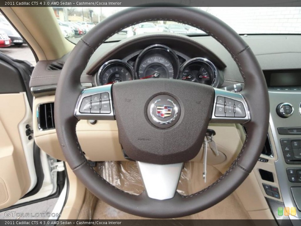 Cashmere/Cocoa Interior Steering Wheel for the 2011 Cadillac CTS 4 3.0 AWD Sedan #46660055