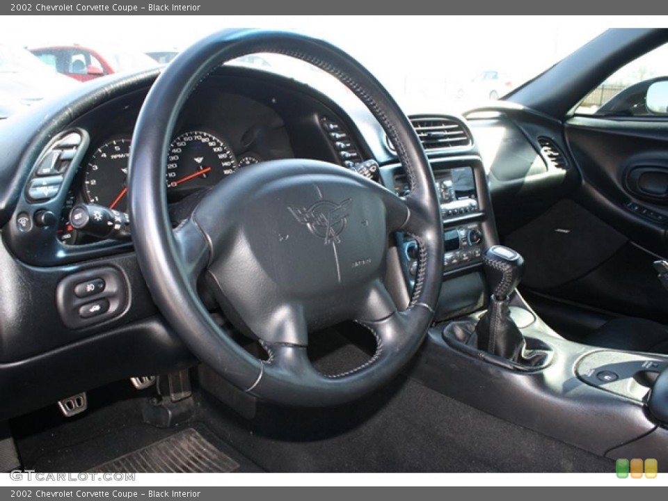 Black Interior Steering Wheel for the 2002 Chevrolet Corvette Coupe #46662038