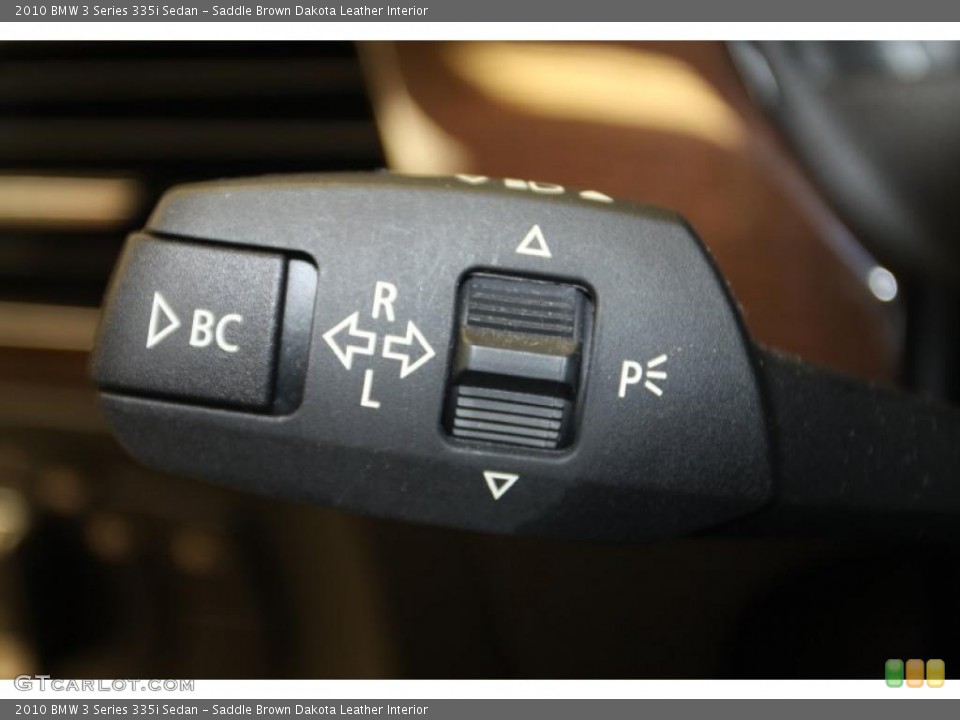 Saddle Brown Dakota Leather Interior Controls for the 2010 BMW 3 Series 335i Sedan #46664849