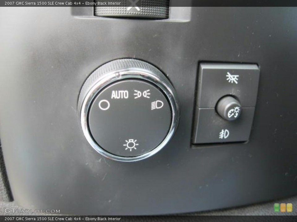 Ebony Black Interior Controls for the 2007 GMC Sierra 1500 SLE Crew Cab 4x4 #46671548