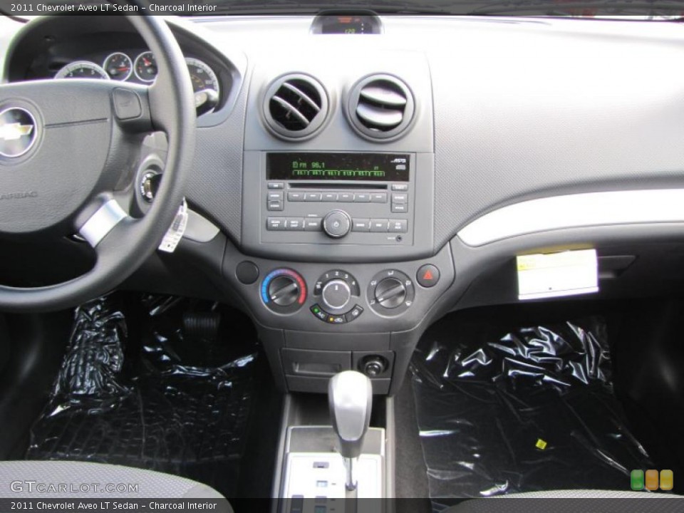 Charcoal Interior Dashboard for the 2011 Chevrolet Aveo LT Sedan #46678859