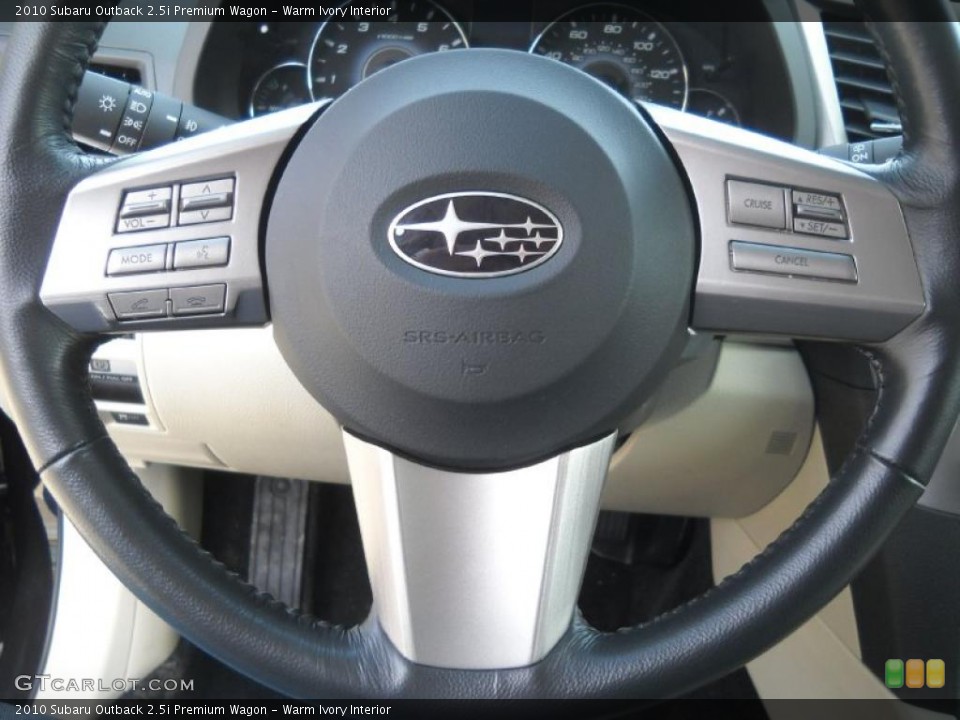 Warm Ivory Interior Steering Wheel for the 2010 Subaru Outback 2.5i Premium Wagon #46694024